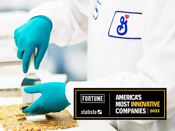 General Mills employee testing snack bars in a lab