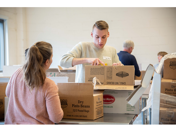 Employee packing boxes