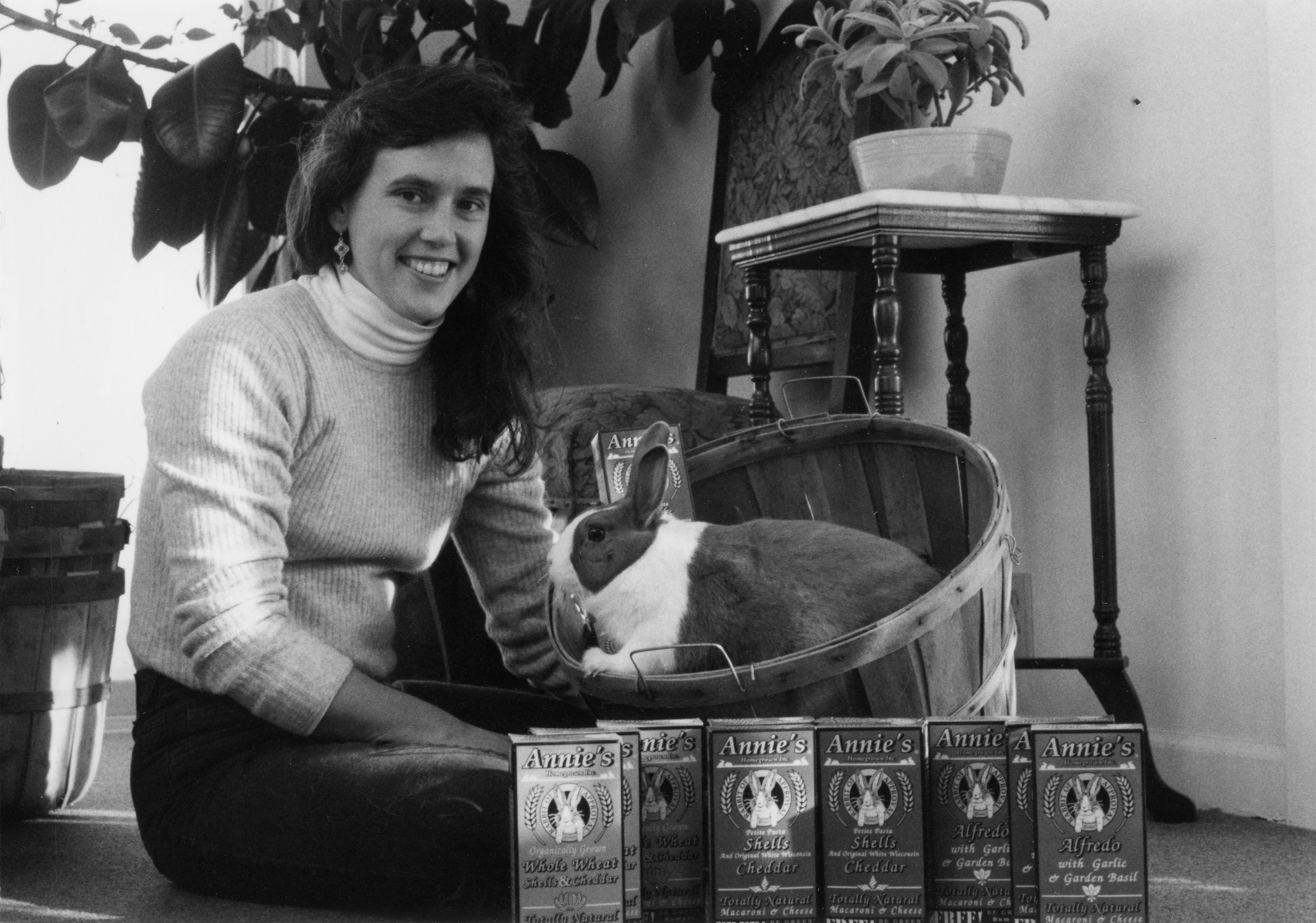 Annie Withey with her pet rabbit and boxes of Annie's macaroni and cheese